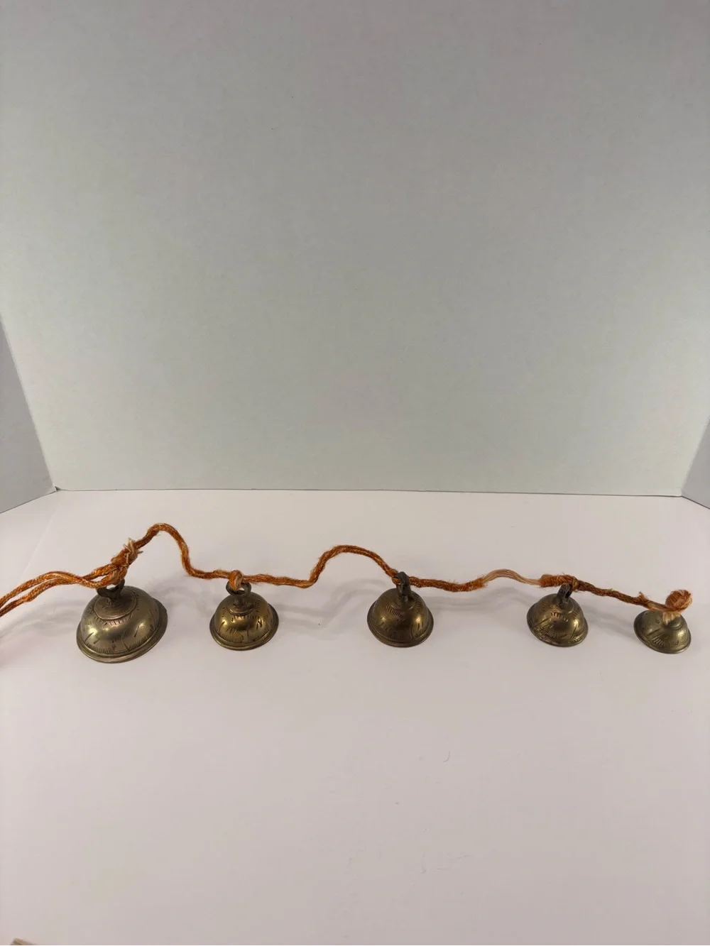 🔔 Vintage Graduated Brass Bells on Rope Garland – Rustic Temple Cow Bells – 24